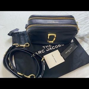 The Marc Jacobs Softshot 21. Original price $465. This is genuine leather.